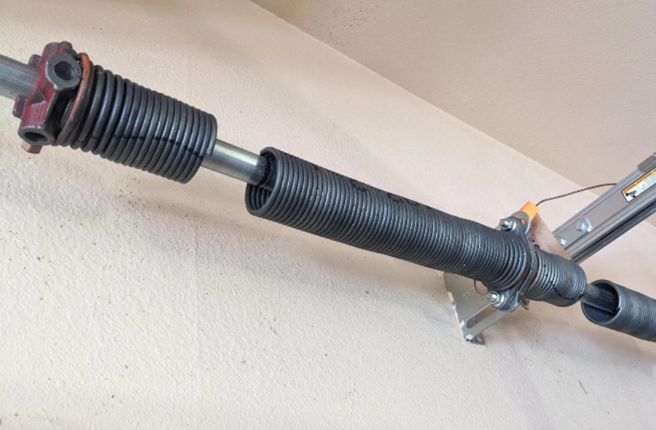 a broken garage door torsion spring