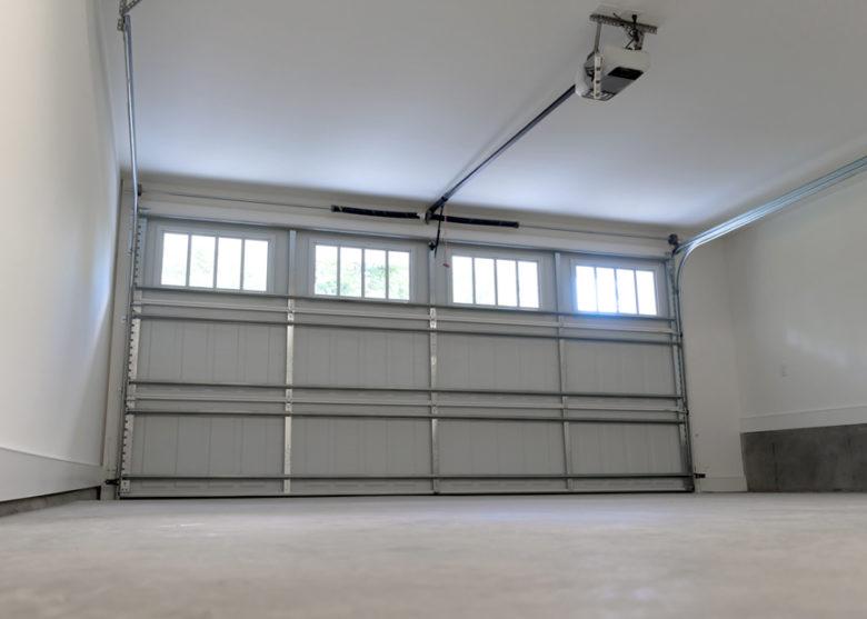 Garage Door Services Houston TX 1 white large sized garage door with a torsion spring